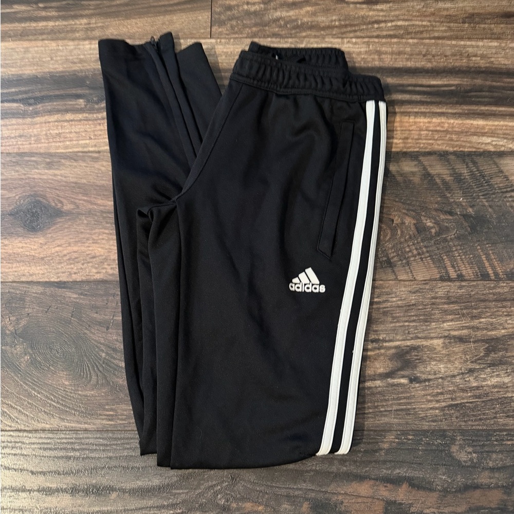 Woman’s adidas track pants